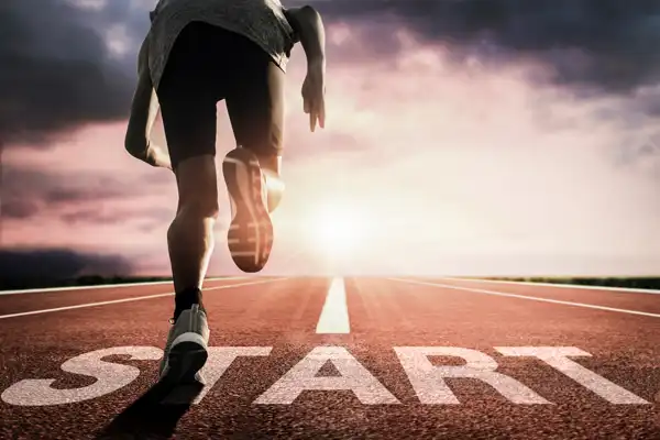 runner at the starting line representing a person that found relief from their debt