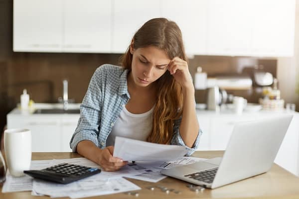 A woman, distressed over her bills considers Chapter 13 Bankruptcy