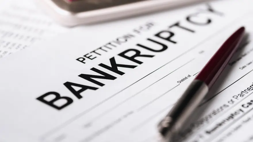 Petition for bankruptcy paperwork on an attorney's desk